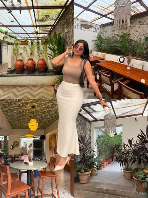 Interiors at Ouza — stone walls, terracotta pots, macramé lighting and patterned tile